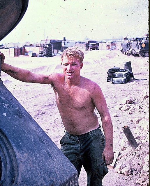 man repairing apc